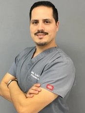 Dr Omar Ayon - Dentist at Dentok