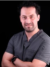 Dr Hector  Aguiñiga - Dentist at Dentok