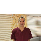 Dr Anil  Curchorcar - Orthodontist at Kenz Dental & Orthodontic Centre