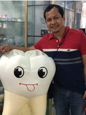 Al Rosas - Dentist at Romero-Rosas Dental Clinic - Bacolod City