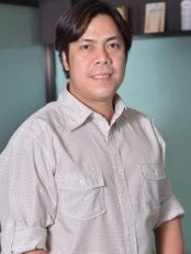 Dr Randy Ortiz - Dentist at Oasis Dental Care-SM Mall of Asia