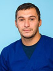 Dr Michal Dziunko - Dentist at Alfa Dent