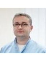 Dr Tomasz Gladysz - Oral Surgeon at Unident Malopolska