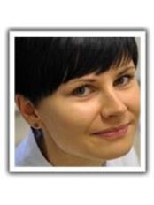 Dr Magdalena Binkowska - Dentist at Dr. Monika Dzieciątkowska