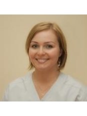 Dr Malgorzata Luszczynska - Dentist at Nowy Impladent