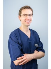 Blazej Betkowski - Dentist at Dr Borzecki Dental Clinic Warsaw