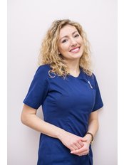 Karolina Tomera - Dentist at Dr Borzecki Dental Clinic Warsaw