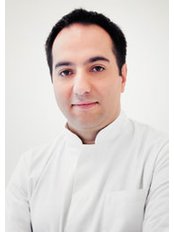Dr Kamil Abed - Oral Surgeon at Impladent - Banderii