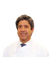 Dr Gil Caroto - Dentist at IPRO Clinic - Advanced Dental Center of Implantology And Aesthetic