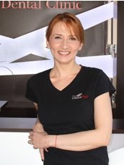 Dr Mihaela Paligora - Dentist at DentalMed Luxury Dental Clinic