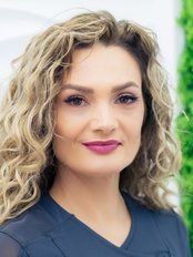 Ms Madalina Radu - Managing Partner at Dentist Fara Durere