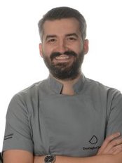 Dr Claudiu  Calin - Dentist at Denttaglio Clinic