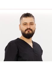 Dr Mircea Furtuna - Dentist at SWISSDENT - Clinica Dr. Petriu