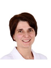 Dr Monika Kovacs - Dentist at Pomadent Dental Clinic