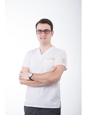dr. Alexandru Rugina - Dentist at Dr. Baldea Dental Clinic