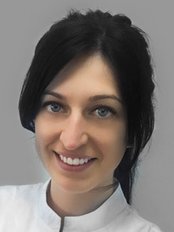 Olga Samsonenko -  at Group Clinics Center for Aesthetic Dentistry - smile Laboratory