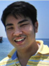 Dr Christopher Tan - Principal Dentist at Caring Dental Sengkang
