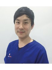 Dr Komsak Chokumnoy - Dentist at Dental Image Ladprao