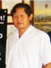 Dr Phongsak Laoprasopwattana - Dentist at Patong Beach Dental Clinic