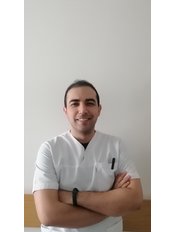 Oguzhan  Gurler - Dentist at International Dental Hospital