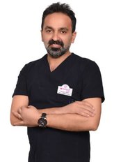 Dr Kenan Sevi - Dentist at VK Smile Dental Clinic