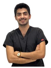 Dr Alican Pugar - Dentist at VK Smile Dental Clinic