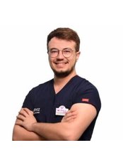 Dr Eyüp Türkay -  at VK Smile Dental Clinic
