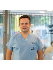 Dr Burc  Ozbodur - Dentist at Dentares Smile Dental Clinic