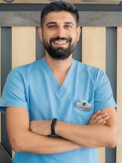 Dr Nurettin Yaman - Dentist at Marina NSMILE Dental Clinic