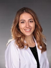 Bernis Kocaoğlu - Dentist at DentHealth Clinic