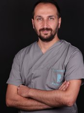 Dr Onur Erdem Erdur - Dentist at Parla Clinic