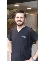Dt. Ozcan Ekici - Dentist at Flora Diş Dental Clinic