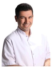 Prof Mehmet Oguz Öztoprak - Orthodontist at Dentapolitan