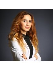 Dr Dt. Selda Yenel - Oral Surgeon at Vividenta