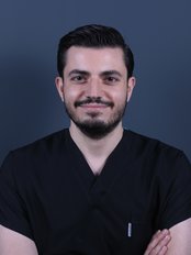 Dr Enes KAYAN - Dentist at Clinic Identity