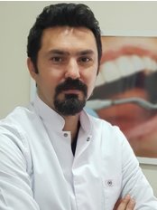Özgür Ulus - Dentist at Stoma Diş Polikliniği