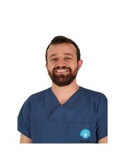 Dr Şenol Aslan -  at İnci Diş