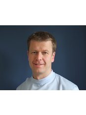 Dr Mark McCreesh -  at Invisible Ortho Specialists - Mulgrew Orthodontics