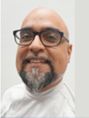 Dr Anoop Singh Gill - Dentist at Dove Dental Care