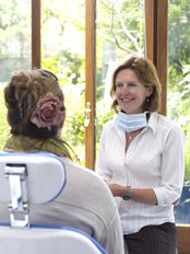 Implant Dentist Consultation - Arnica Dental Care