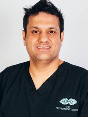 Ravindra Poddar - Dentist at The Peppermint Group - Dental Clinic