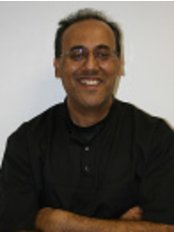 Dr Sanjay Chandarana - Dentist at City Dental Practice