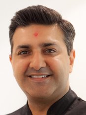 Dr Bhavnish Waghela - Principal Dentist at Natural Smiles Leicester