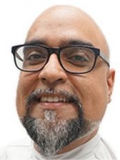 Dr Anoop Gill - Principal Dentist at Ralston Dental and Cosmetic Clinic