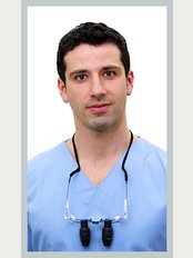Forest & Ray - Dentists, Orthodontists, Implant Surgeons - Dr. Georgios Papagrigorakis Dentist