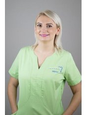 Dr Andreea Pop - Dentist at London Dental Implant