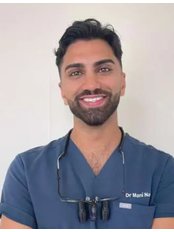 Dr Mani Nasir - Dentist at Dental Care Centre