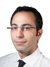 Mr Roozbeh Akhavan - Principal Dentist at Rushey Green Dental Practice