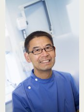 Essential Dental Care - Dr. Paul Au BDS MSc  Clinical Director
