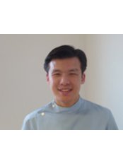 Dr Wilson Yong -  at Crescent Dental Care